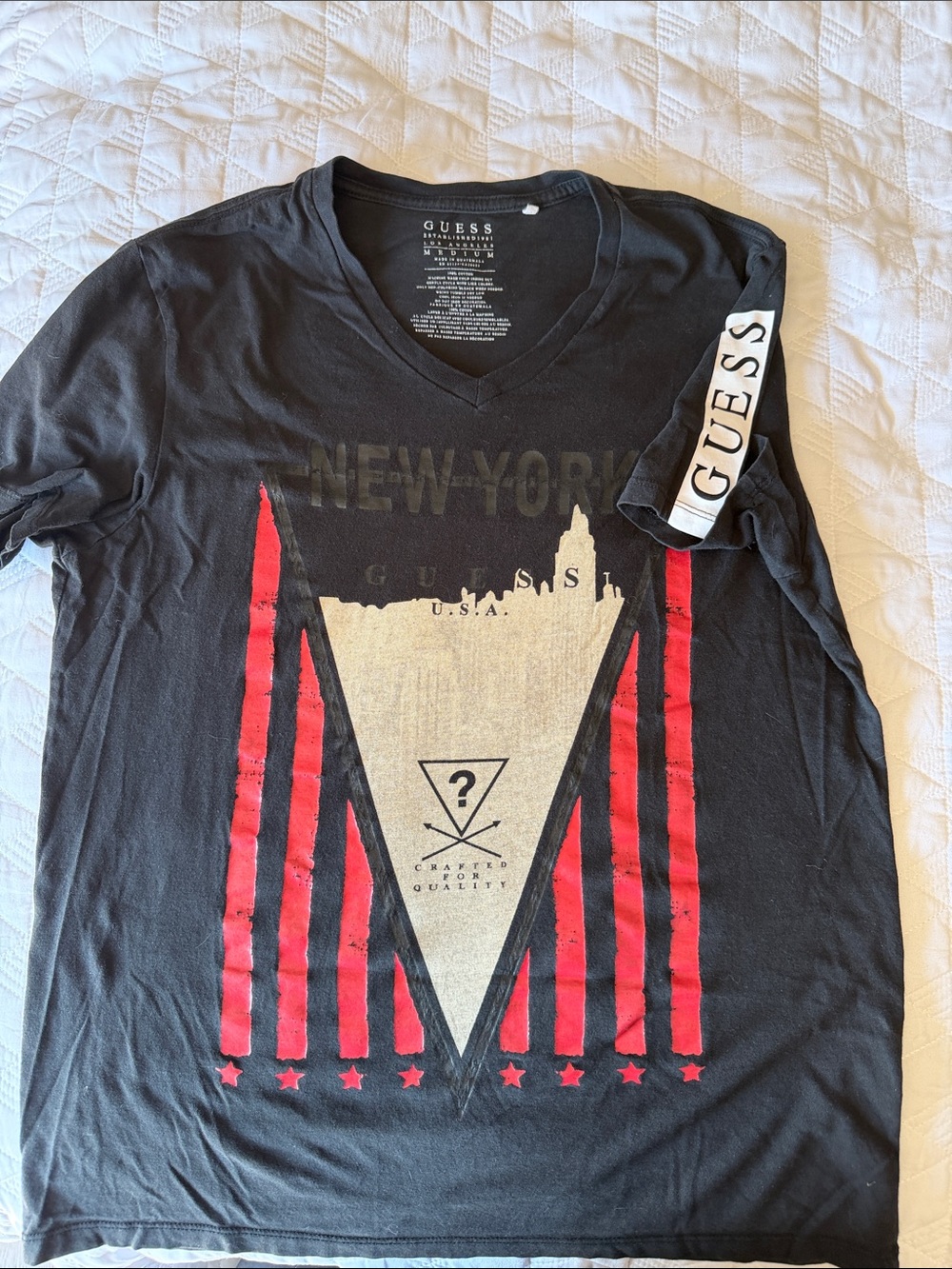 GUESS Black V‑Neck Graphic Tee with Red and Cream Print